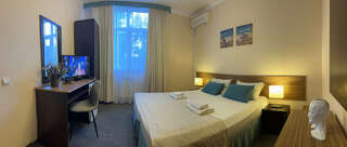 Гостиница Винговер Сукко Стандартный трехместный номер-7